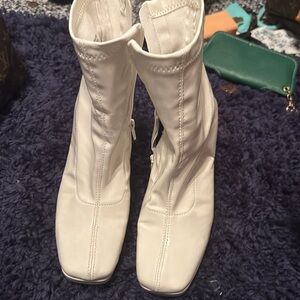 Wild pair white boots